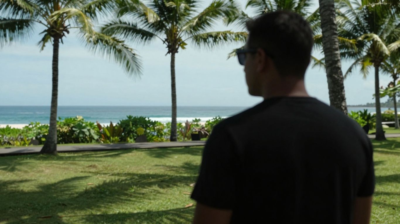 Private investigator in Bali observing the landscape.